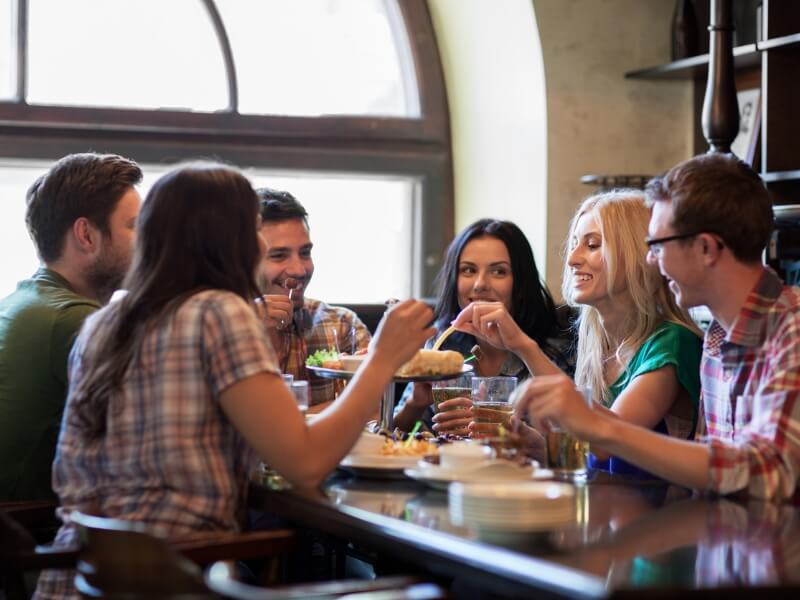 Group of Friends Celebrating at a Restaurant